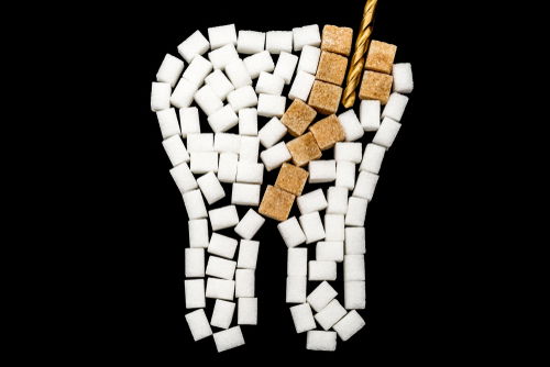 Blog Image: Sugar Damages Dental Enamel and Causes Cavities Blog Image: Sugar Damages Dental Enamel and Causes Cavities